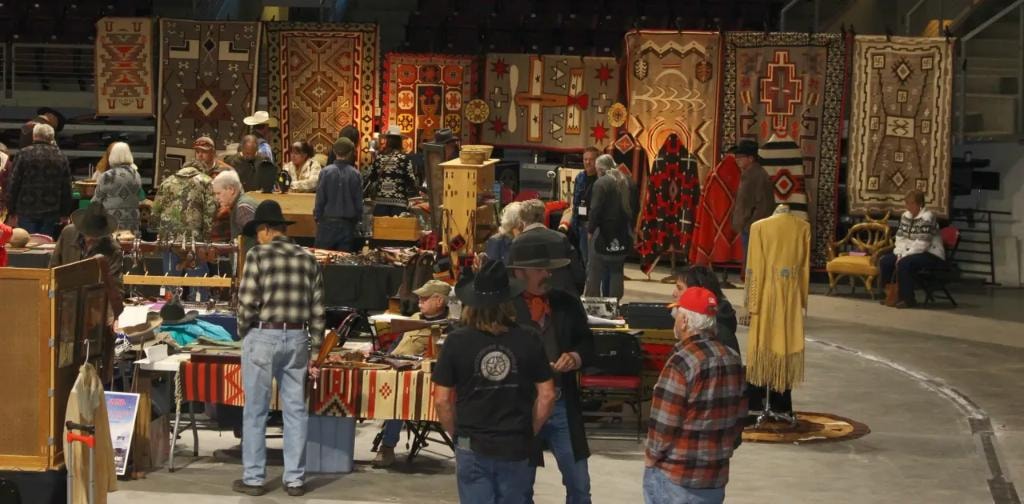 Indoor market with Navajo rugs and western collectibles