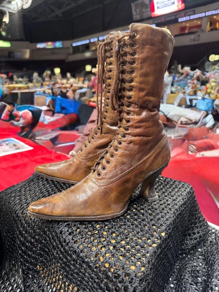 Antique Victorian brown lace-up boots at the show