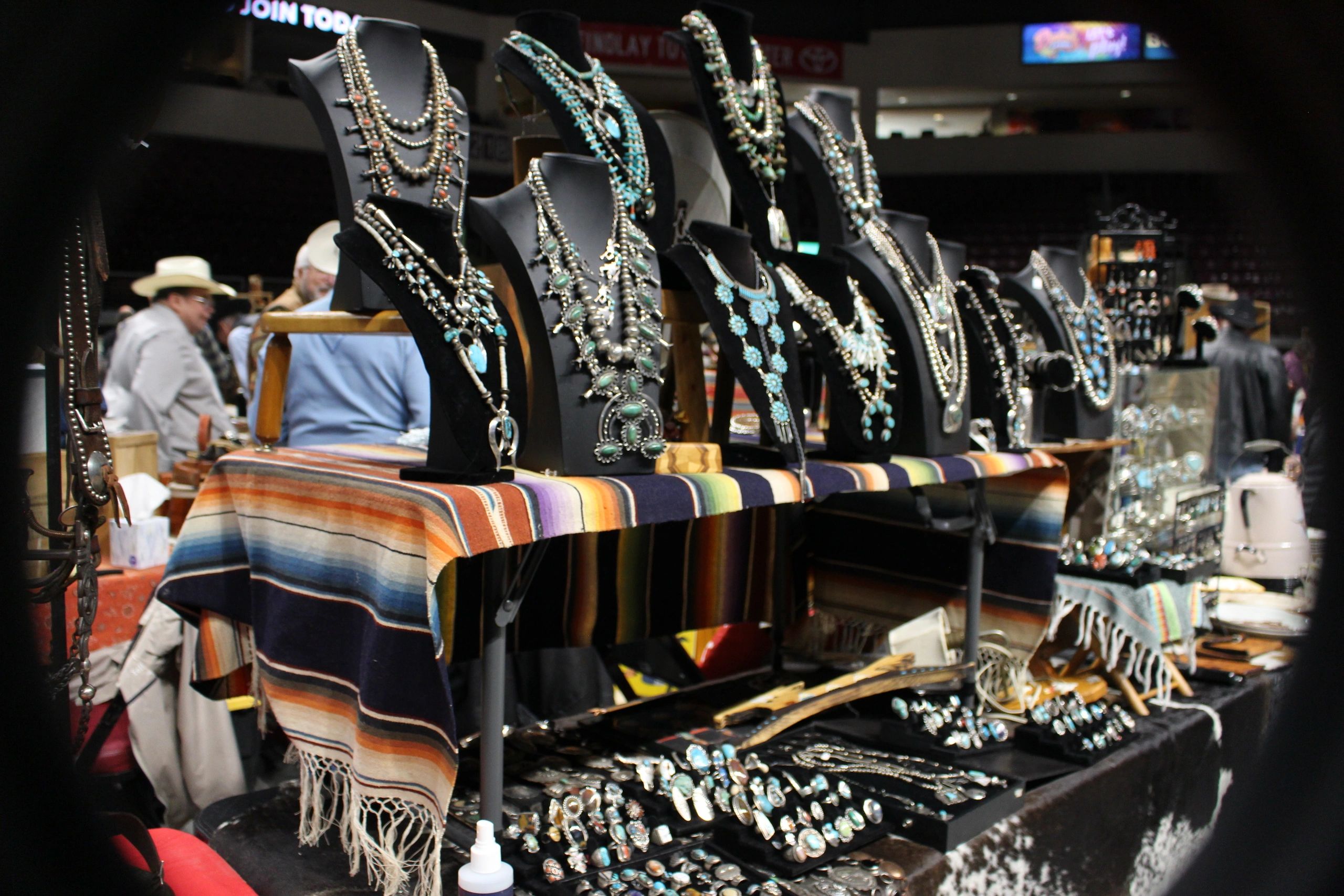 Native American turquoise jewelry display at vendor booth
